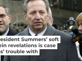 Larry Summers, center, is surrounded by the media in 2005 amid calls for his resignation. Jodi Hilton/Getty Images